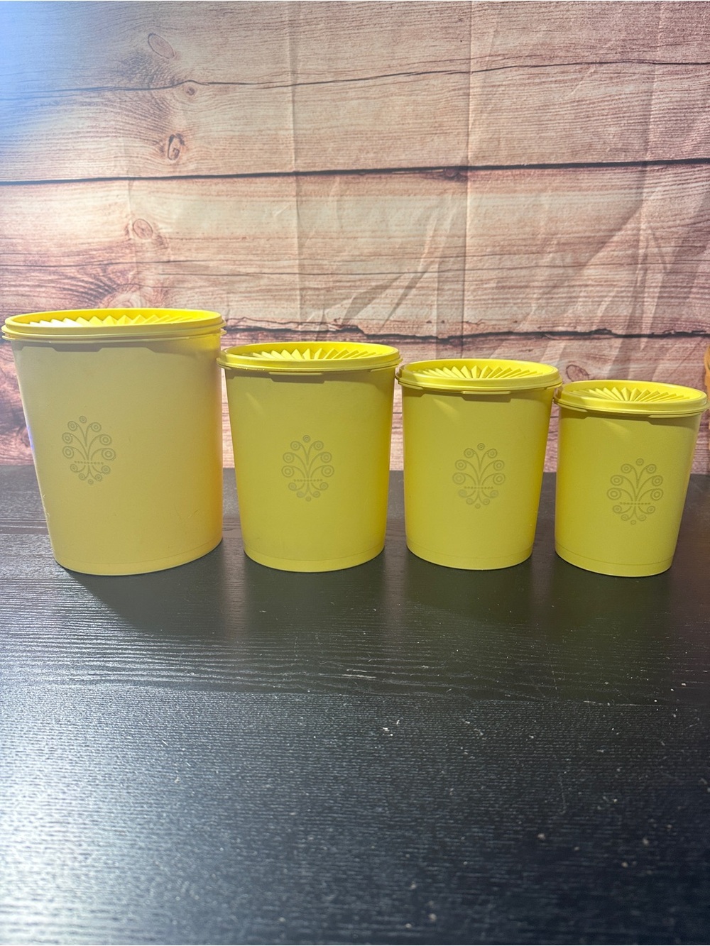Set of 4 Tupperware Daffodil Yellow Servalier Canisters with Sunburst Lids